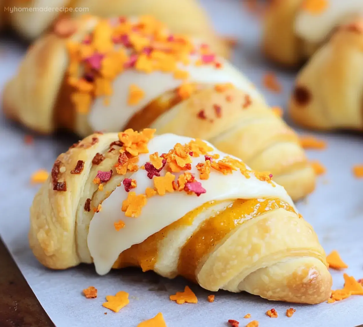 Rollos de calabaza y queso crema con glaseado naranja